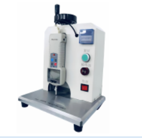 Embossed card spot pressure test fixture